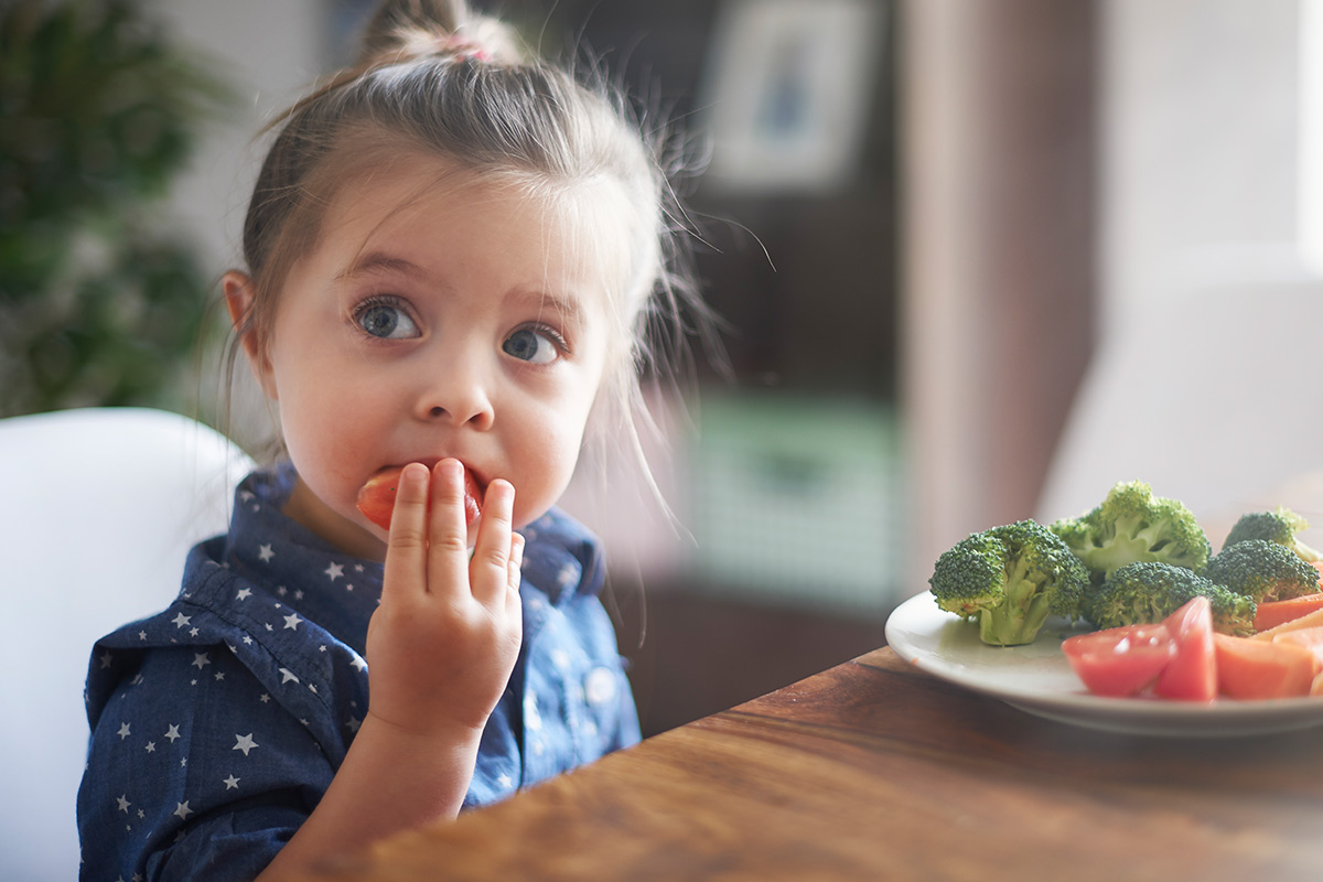 child eating healthy meal