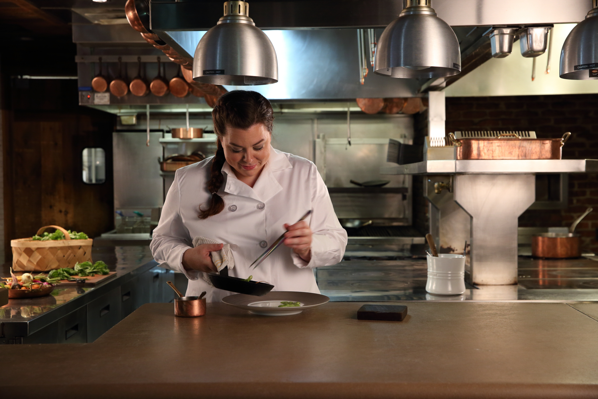 chef Cassidee Dabney of blackberry farm in Tennessee in her kitchen