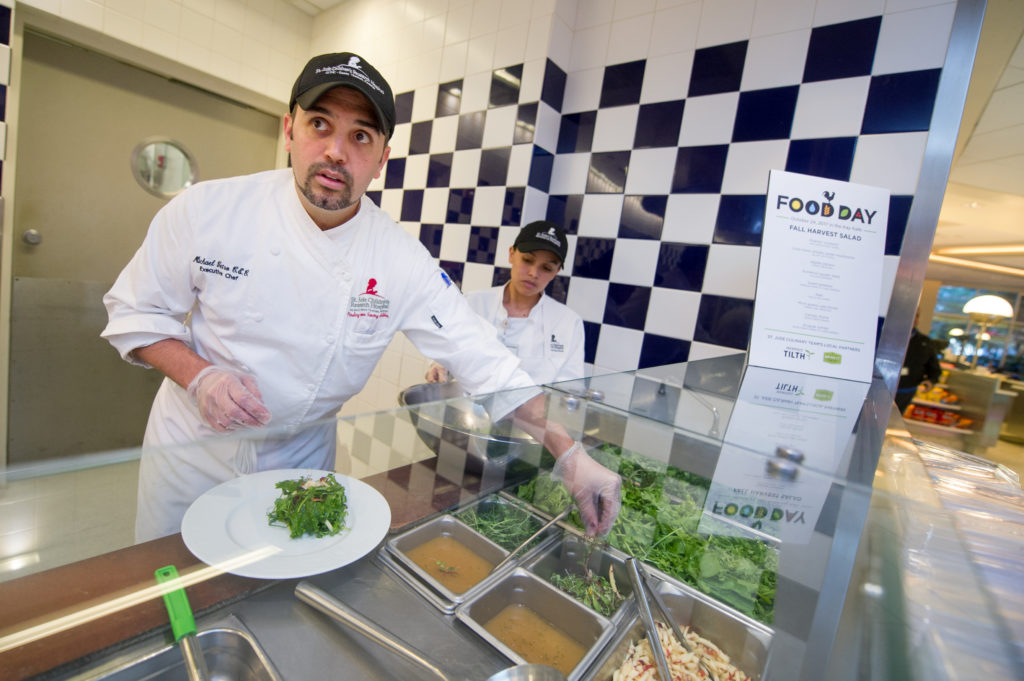 st. Jude staff working Michael Vetro (Food Services), Maria Loa (Food Services)