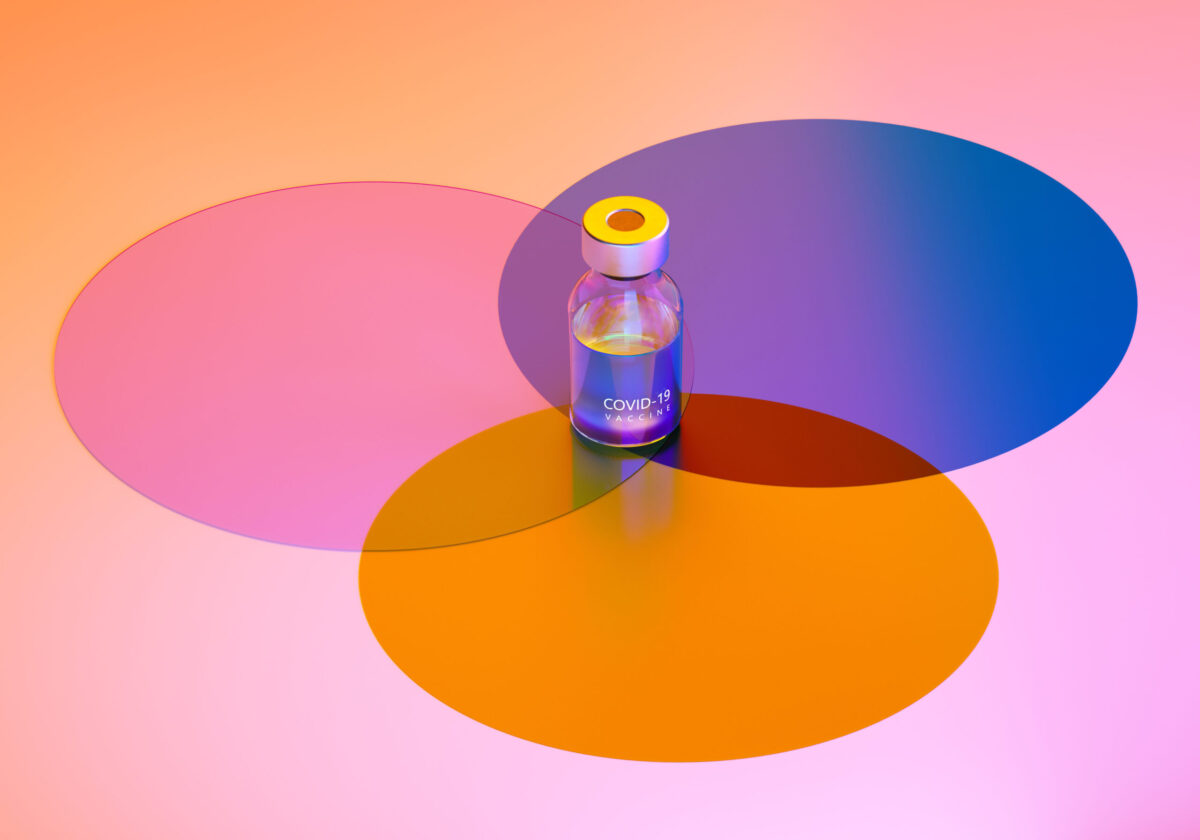 Digital generated image of COVID-19 vaccine bottle standing on multi coloured circles on purple background.