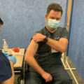 Dr. Prosser getting a COVID-19 vaccine.