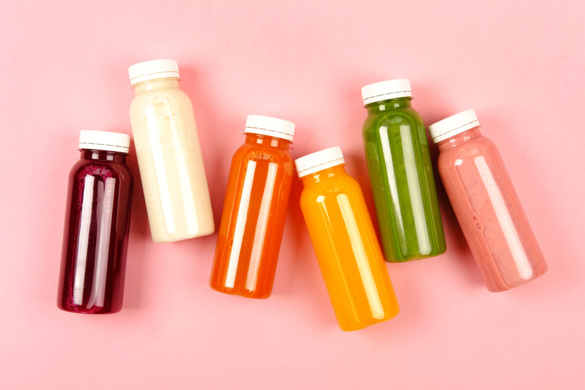 Bottles of multicolored juices