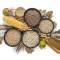 large group of wholegrain food shot from above on white background