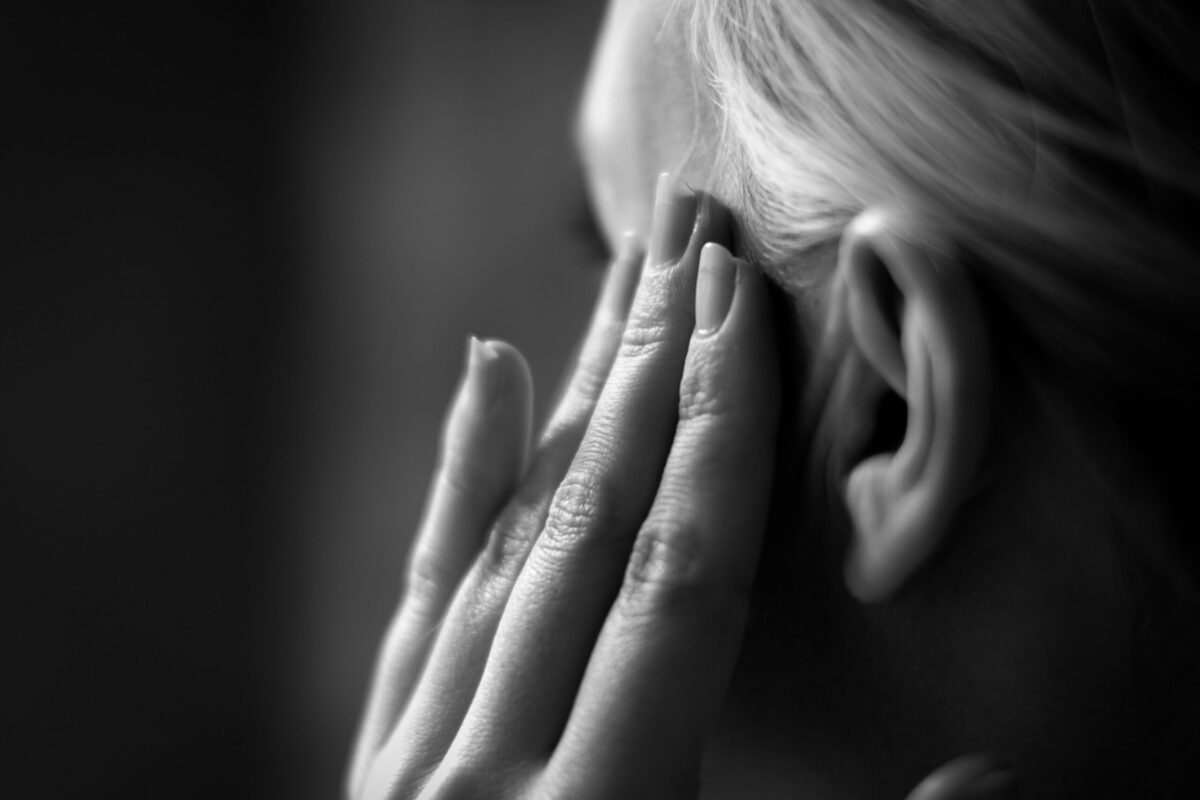 Cropped Image Of Woman Suffering From Migraine