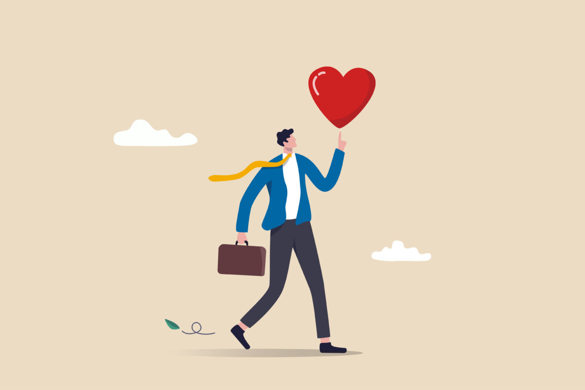 Work passion to motivate and inspire employee to achieve career success, love your job or happy and enjoy working dream job concept, happy businessman holding passionate heart shape walking to work.