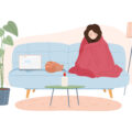 Girl in warm clothes and warms herself under a blanket. Cat lies. Vector illustration.