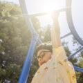 Child playing on playground.