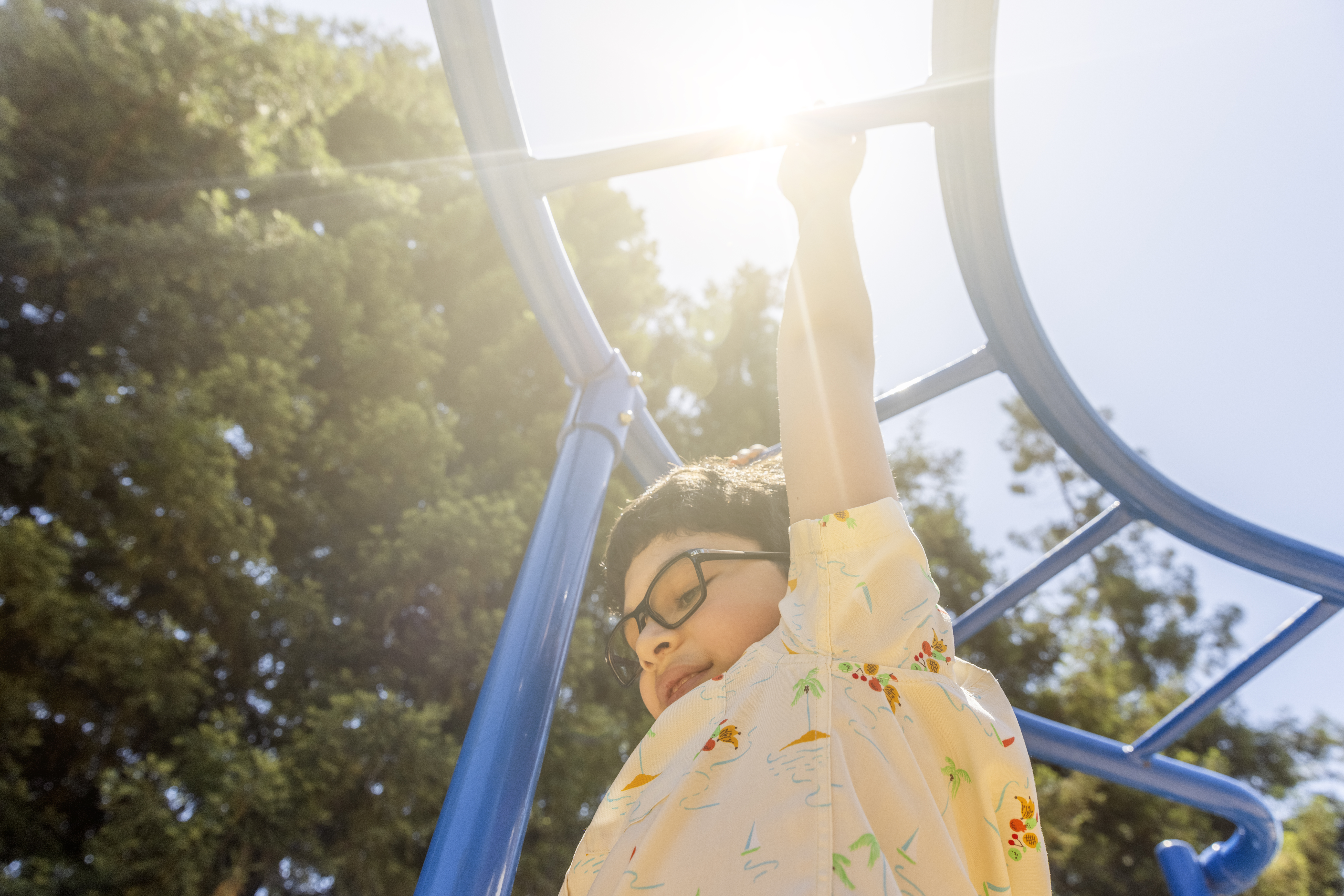 Child playing on playground.