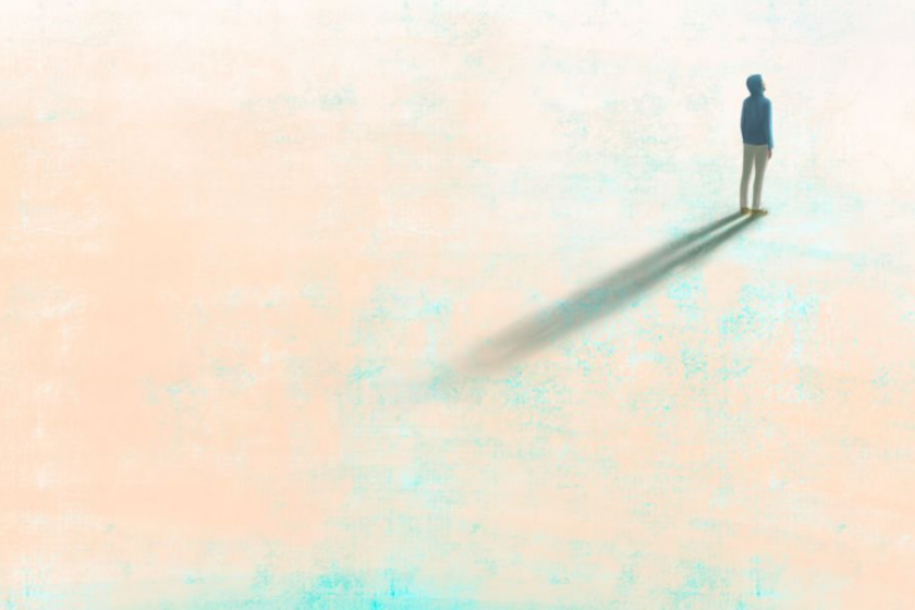 Illustration of a person alone on a muted canvas, looking into the distance with shadow of the person's figure.