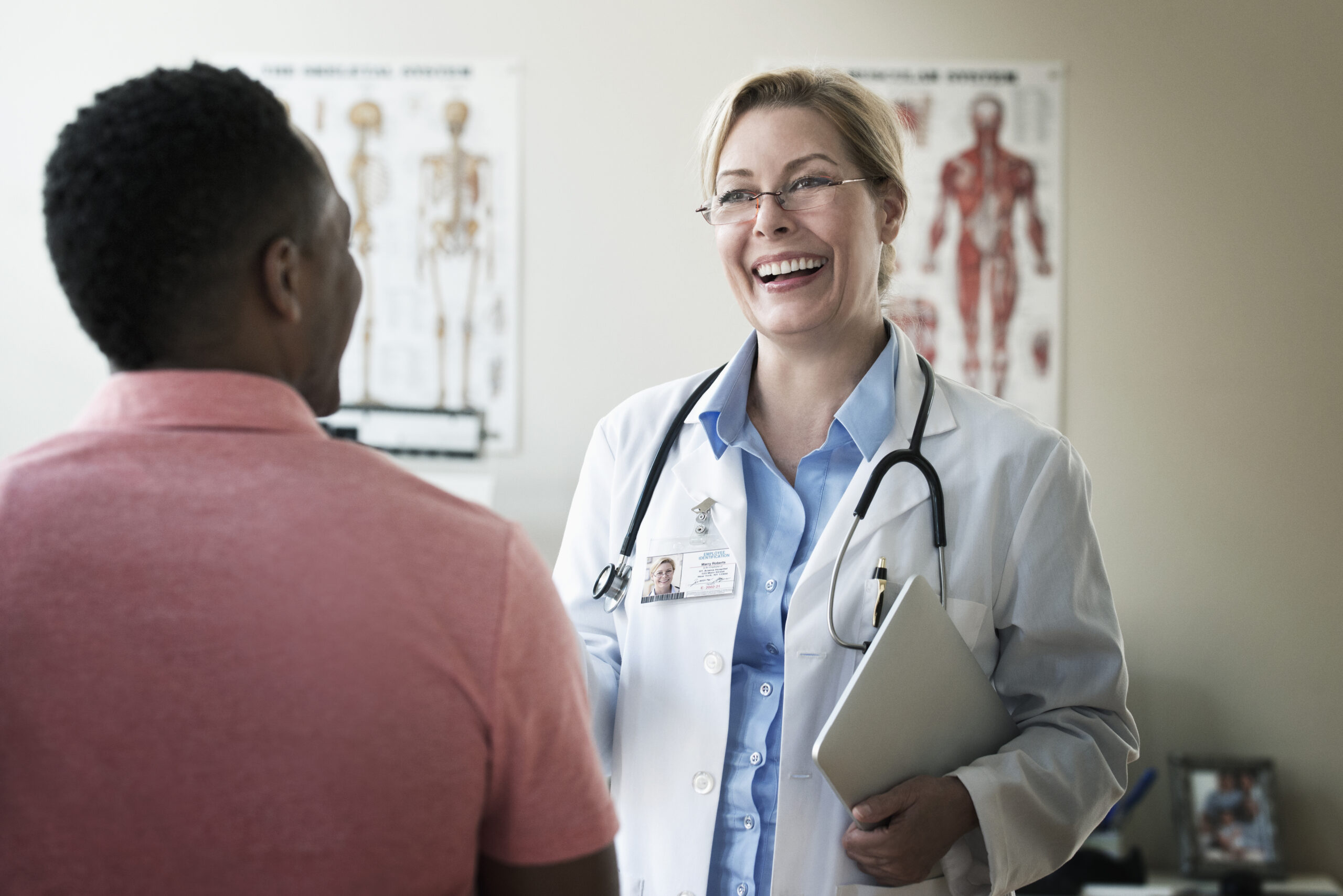 Doctor and patient talking in clinic