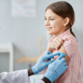 Smiling Girl Getting Vaccinated